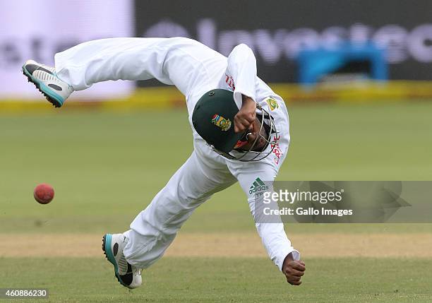 Temba Bavuma dives at short-leg during day 4 of the 2nd Test match between South Africa and West Indies at St. Georges Park on December 29, 2014 in...