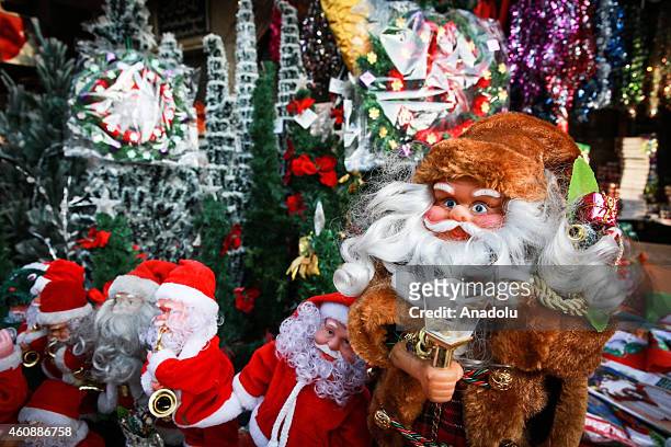 Christmas stock is displayed at stores in Shubra district of Cairo, Egypt on December 26, 2014 as preparations for Christmas celebrations get started...