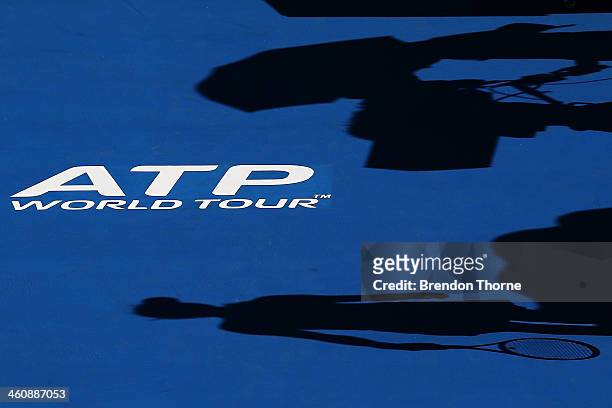 Shadow of a camera operator and Ekaterina Makarova of Russia is seen on Ken Rosewall Arena during day two of the Sydney International at Sydney...