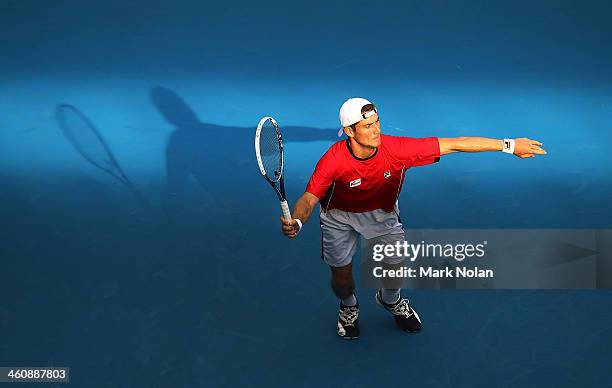 Matthew Ebden of Australia plays a forehand in his match against Julien Benneteau of France during day two of the Sydney International at Sydney...