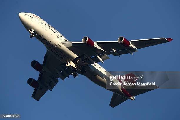 The suspected Virgin Atlantic Boeing 747 jumbo jet passenger plane hovers in the sky as it reportedly prepares for a non-standard landing at Gatwick...