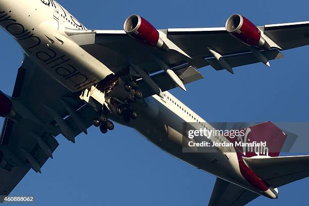 The suspected Virgin Atlantic Boeing 747 jumbo jet passenger plane hovers in the sky as it reportedly prepares for a non-standard landing at Gatwick...