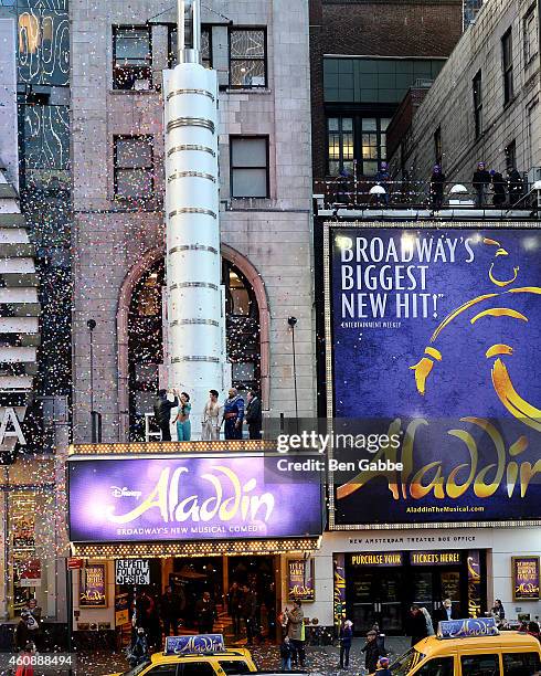 Cast members of Broadway's Aladdin attends Times Square Prepares For 2015 - Confetti Test at New Amsterdam Theatre on December 29, 2014 in New York...