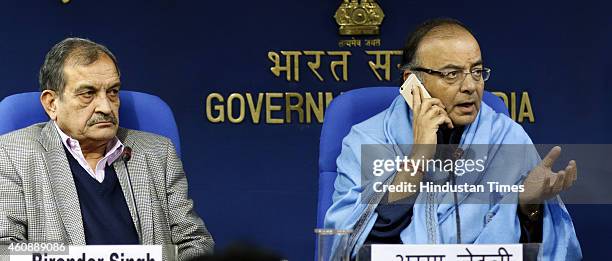 Union Finance Minister Arun Jaitley along with Union Rural Development and Panchayati Raj Birender Singh addressing a press conference after a...