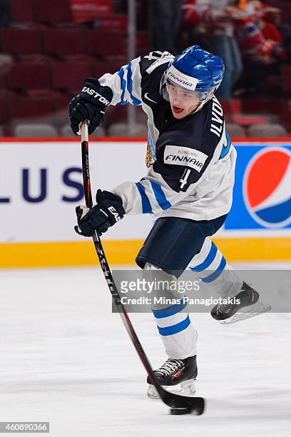 Mika Ilvonen of Team Finland takes a shot during the warmup period prior to the 2015 IIHF World Junior Hockey Championship game against Team United...