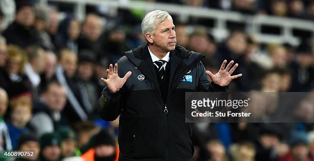 Newcastle manager Alan Pardew reacts during the Barclays Premier League match between Newcastle United and Everton at St James' Park on December 28,...