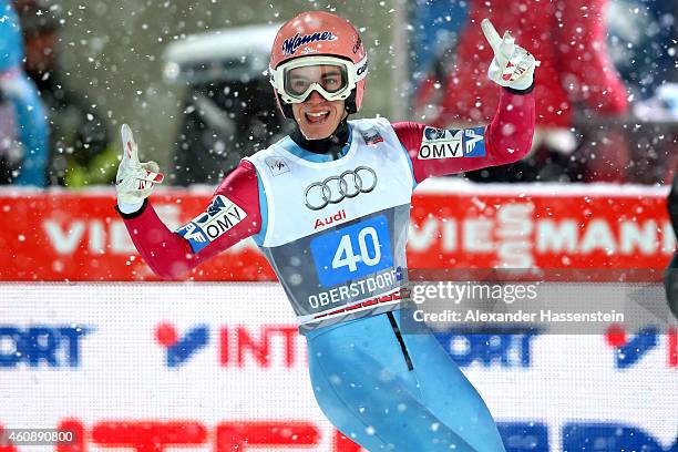 Stefan Kraft of Austria celebrates after his final jump on day 2 of the Four Hills Tournament Ski Jumping event at Schattenberg-Schanze Erdinger...