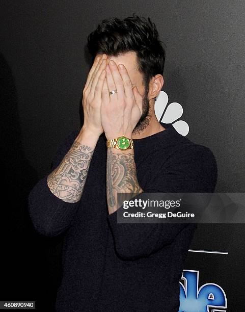 Singer Adam Levine arrives at The PEOPLE Magazine Awards at The Beverly Hilton Hotel on December 18, 2014 in Beverly Hills, California.