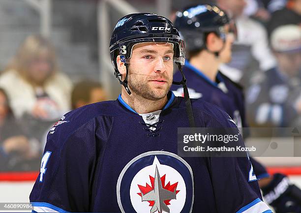 Grant Clitsome of the Winnipeg Jets looks on during the pre-game warm up prior to NHL action against the Philadelphia Flyers on December 21, 2014 at...