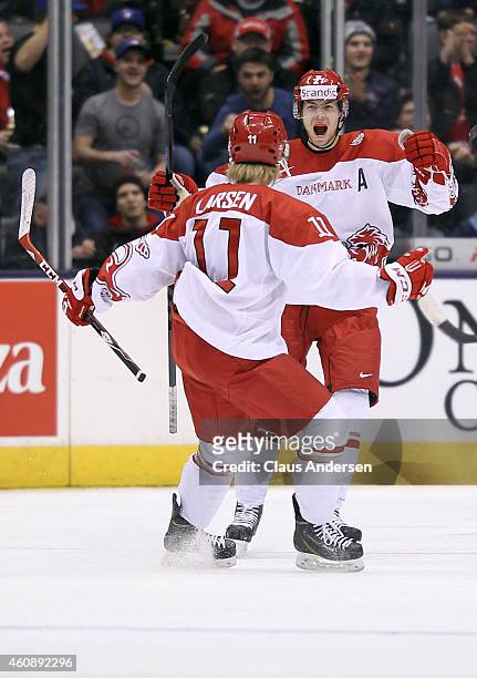 Oliver Bjorkstrand of Team Denmark celebrates his tying goal against Team Czech Republic during the 2015 IIHF World Junior Hockey Championship at the...