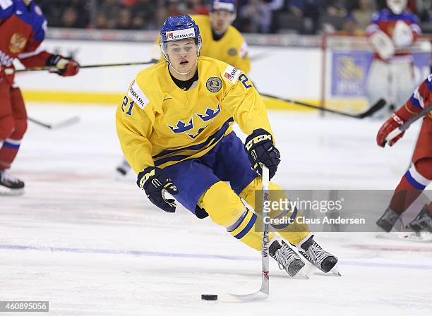 William Nylander of Team Sweden circles with the puck against Team Russia in a 2015 IIHF World Junior Championship game at the Air Canada Centre on...