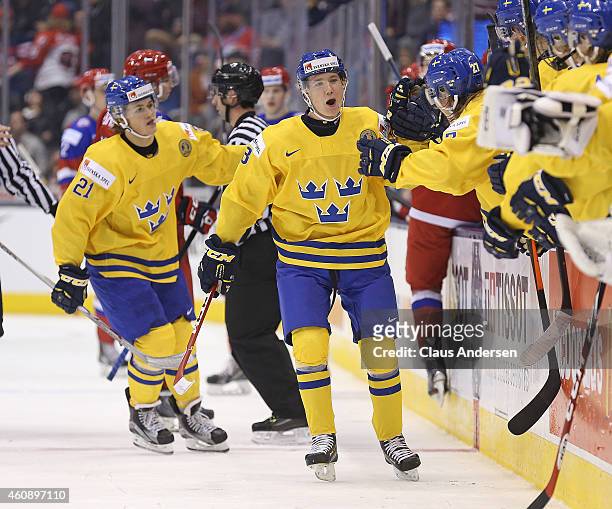 Gustav Forsling of Team Sweden celebrates a goal against Team Russia in a 2015 IIHF World Junior Championship game at the Air Canada Centre on...