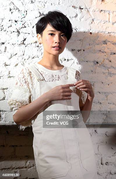 Singer Rainie Yang shoots photographs during a personal interview on December 29, 2014 in Taipei, Taiwan of China.