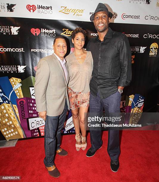 Keenan Towns, Tracy Mourning and Alonzo Mourning at JW Marriott Marquis on December 28, 2014 in Miami, Florida.