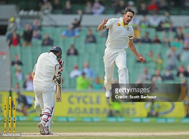 Mitchell Johnson of Australia celebrates after bowling Cheteshwar Pujara of India during day five of the Third Test match between Australia and India...