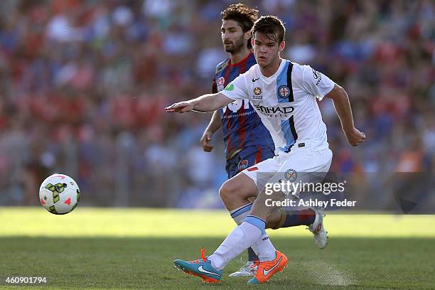 Zenon Caravella of the Jets contests the ball against Connor Chapman of Melbourne City during the round 14 A-League match between the Newcastle Jets...