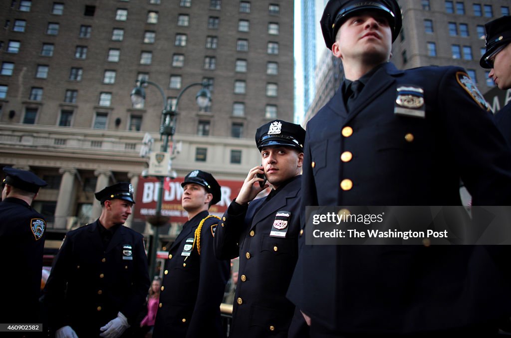 MANHATTAN, NY - DECEMBER 29: NYPD officers exit their graduatio