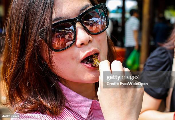 Woman Eating Insect 62 Woman Eating Insects Stock Photos, High-Res Pictures, and Images ...
