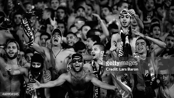 Fans of Casablanca are seen during the FIFA Club World Cup Quarterfinal match between Raja Casablanca and CF Monterrey at Agadir Stadium on December...