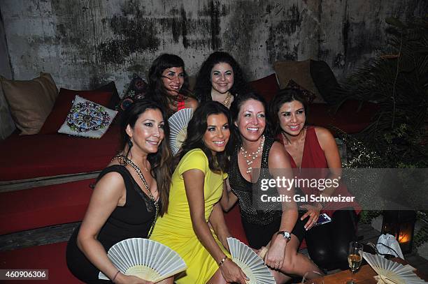 Actress Eva Longoria and guests pose for a photo during the Pre New Year´s Affair in celebration of the Opening of W Bogotá held at Casa de las...