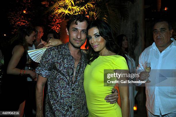 Colombian designer Esteban Cortazar and actress Eva Longoria pose for a photo during the Pre New Year´s Affair in celebration of the Opening of W...