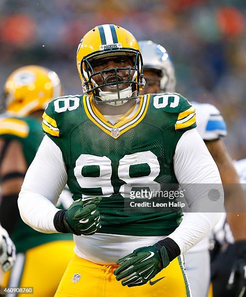 Letroy Guion of the Green Bay Packers reacts on a big stop during the first quarter of the game against the Detroit Lions at Lambeau Field on...