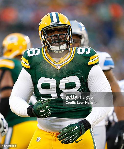 Letroy Guion of the Green Bay Packers reacts on a big stop during the first quarter of the game against the Detroit Lions at Lambeau Field on...