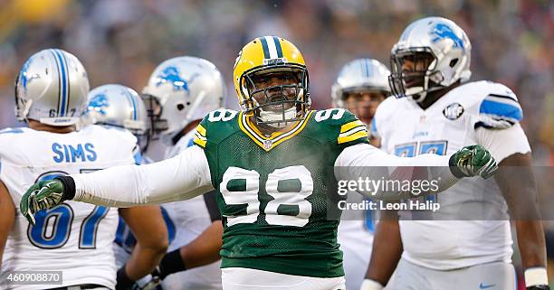 Letroy Guion of the Green Bay Packers reacts on a big stop during the first quarter of the game against the Detroit Lions at Lambeau Field on...