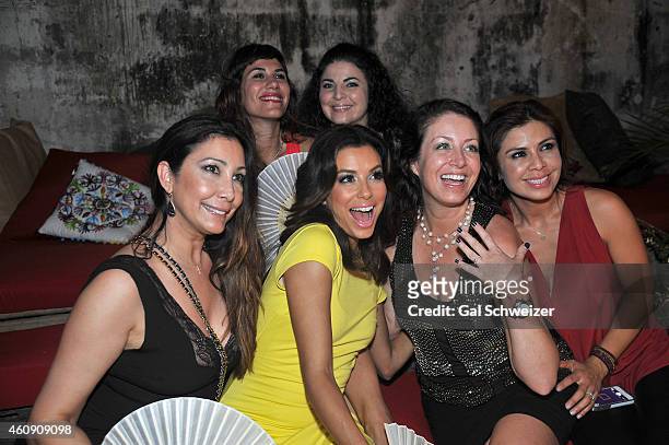 Actress Eva Longoria and guests pose for a photo during the Pre New Year´s Affair in celebration of the Opening of W Bogotá held at Casa de las...