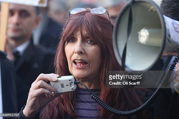 Janis Sharp, the mother of computer hacker Gary McKinnon, addresses a demonstration outside Westminster Magistrates Court against the Government's...