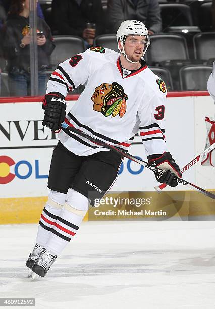 Tim Erixon of the Chicago Blackhawks skates prior to the game against the Colorado Avalanche at the Pepsi Center on December 27, 2014 in Denver,...