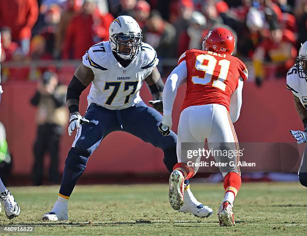 Offensive tackle King Dunlap of the San Diego Chargers gets set to block linebacker Tamba Hali of the Kansas City Chiefs during the first half on...