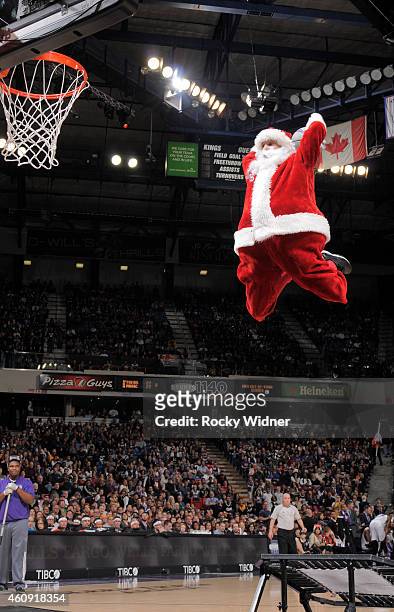 Santa Claus dunks during the game between the Los Angeles Lakers and Sacramento Kings on December 21, 2014 at Sleep Train Arena in Sacramento,...