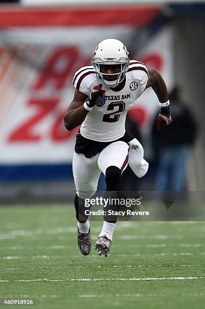 Speedy Noil of the Texas A&M Aggies runs a pass route against the West Virginia Mountaineers during the 56th annual Autozone Liberty Bowl at Liberty...