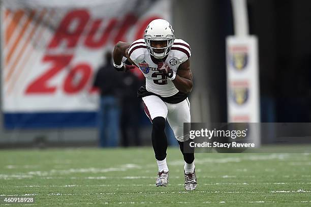 Speedy Noil of the Texas A&M Aggies runs a pass route against the West Virginia Mountaineers during the 56th annual Autozone Liberty Bowl at Liberty...