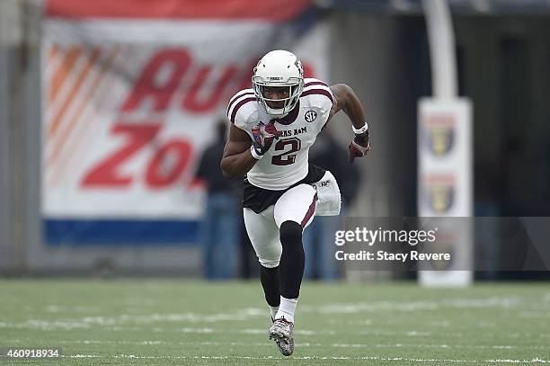 Speedy Noil of the Texas A&M Aggies runs a pass route against the West Virginia Mountaineers during the 56th annual Autozone Liberty Bowl at Liberty...