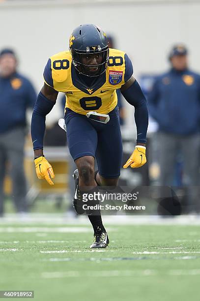 Karl Joseph of the West Virginia Mountaineers anticipates a play against the Texas A&M Aggies during the 56th annual Autozone Liberty Bowl at Liberty...