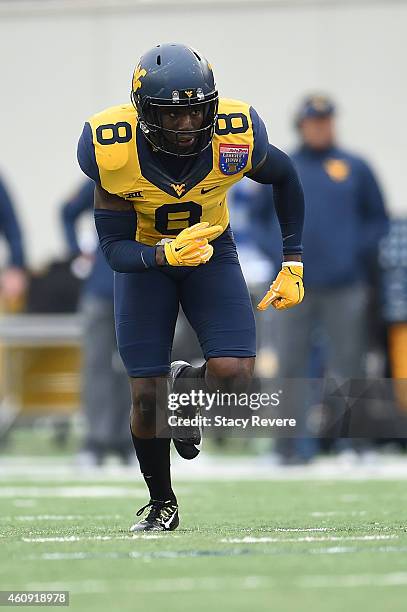 Karl Joseph of the West Virginia Mountaineers anticipates a play against the Texas A&M Aggies during the 56th annual Autozone Liberty Bowl at Liberty...