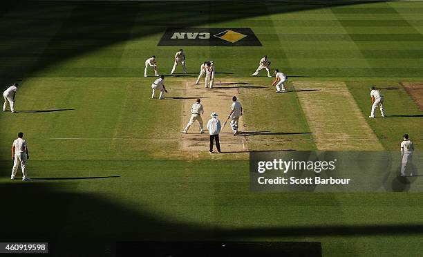 Nathan Lyon of Australia bowls during day five of the Third Test match between Australia and India at Melbourne Cricket Ground on December 30, 2014...