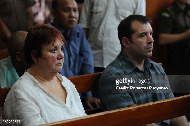 Andrea Waldeck's mother and brother wait in court at a hearing for drug trafficking charges on January 6, 2014 in Surabaya, Indonesia. Prosecutors...