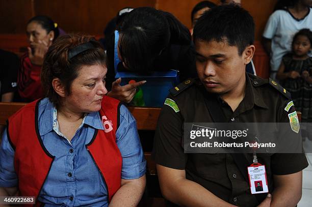 Andrea Waldeck of Britian waits in court at a hearing for drug trafficking charges on January 6, 2014 in Surabaya, Indonesia. Prosecutors are seeking...