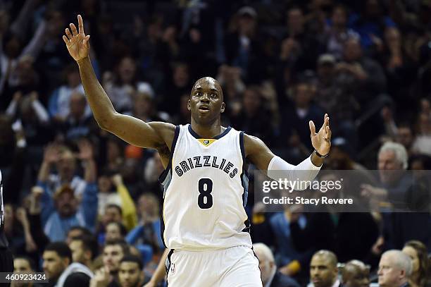 Quincy Pondexter of the Memphis Grizzlies reacts to a score against the San Antonio Spurs during the second quarter of a game at the FedExForum on...