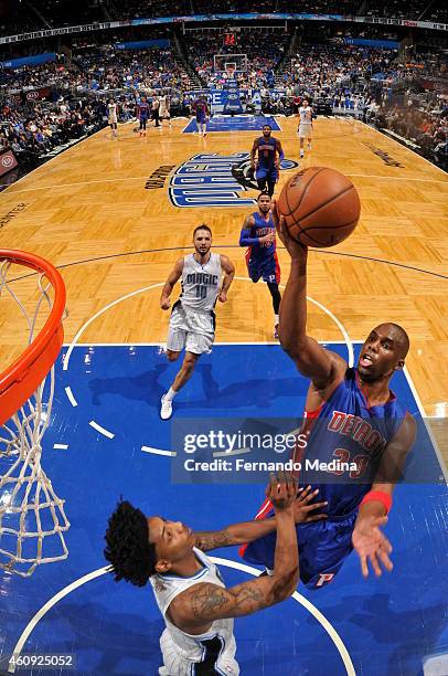 Jodie Meeks of the Detroit Pistons goes to the basket against the Orlando Magic on December 30, 2014 at Amway Center in Orlando, Florida. NOTE TO...