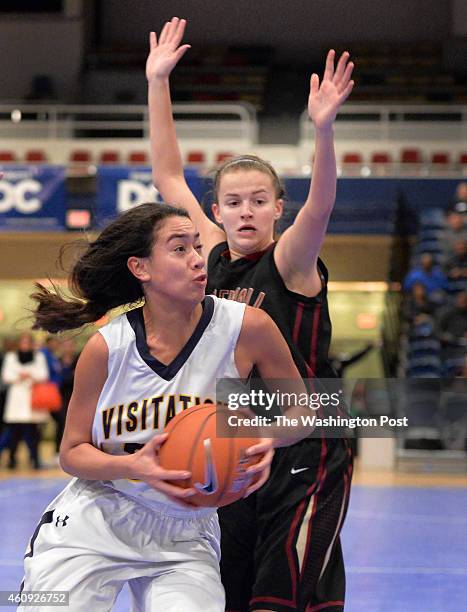 Georgetown Visitation's Maddy Reed goes to the basket pass Stonewall Jackson's Hayley Nordike in the Title IX Holiday Invitational Classic at the DC...