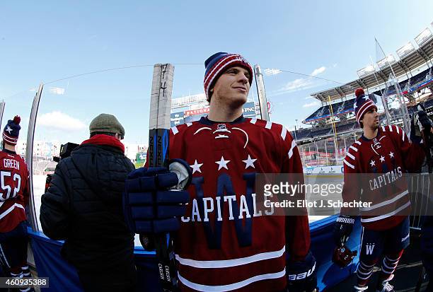 Mike Green, John Carlson and Matt Niskanen of the Washington Capitals wait to take the ice for practice prior to the 2015 Bridgestone NHL Winter...