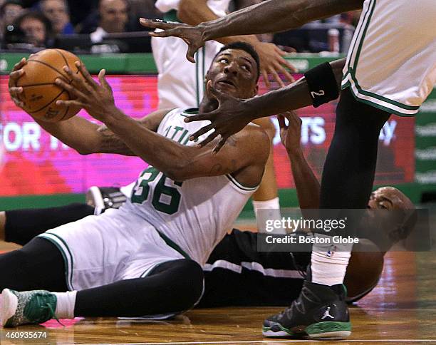 After making a diving steal of the ball from Brooklyn Nets guard Jarrett Jack, Smart throws down court for the assist to Boston Celtics forward Jeff...