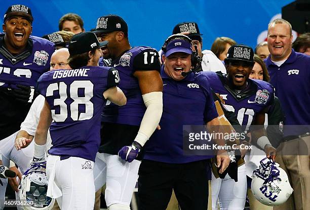 Head coach Gary Patterson of the TCU Horned Frogs celebrates with his team during their 42 to 3 win over the Ole Miss Rebels during the Chik-fil-A...
