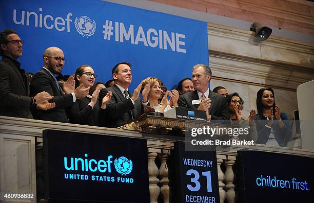 Fund for UNICEF Senior Vice President of Development Barron Segar and UNICEF Deputy Executive Director Yoka Brandt ring the closing bell at New York...