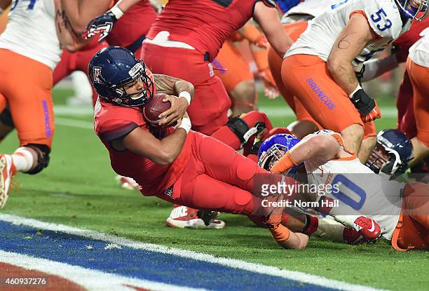 Anu Solomon of the Arizona Wildcats dives into the endzone during the first quarter against the Boise State Broncos at University of Phoenix Stadium...