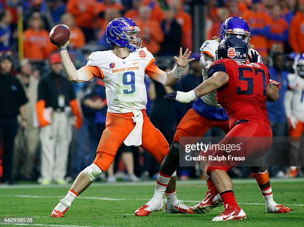 Quarterback Grant Hedrick of the Boise State Broncos throws a pass against the Arizona Wildcats during the second quarter of the Vizio Fiesta Bowl at...